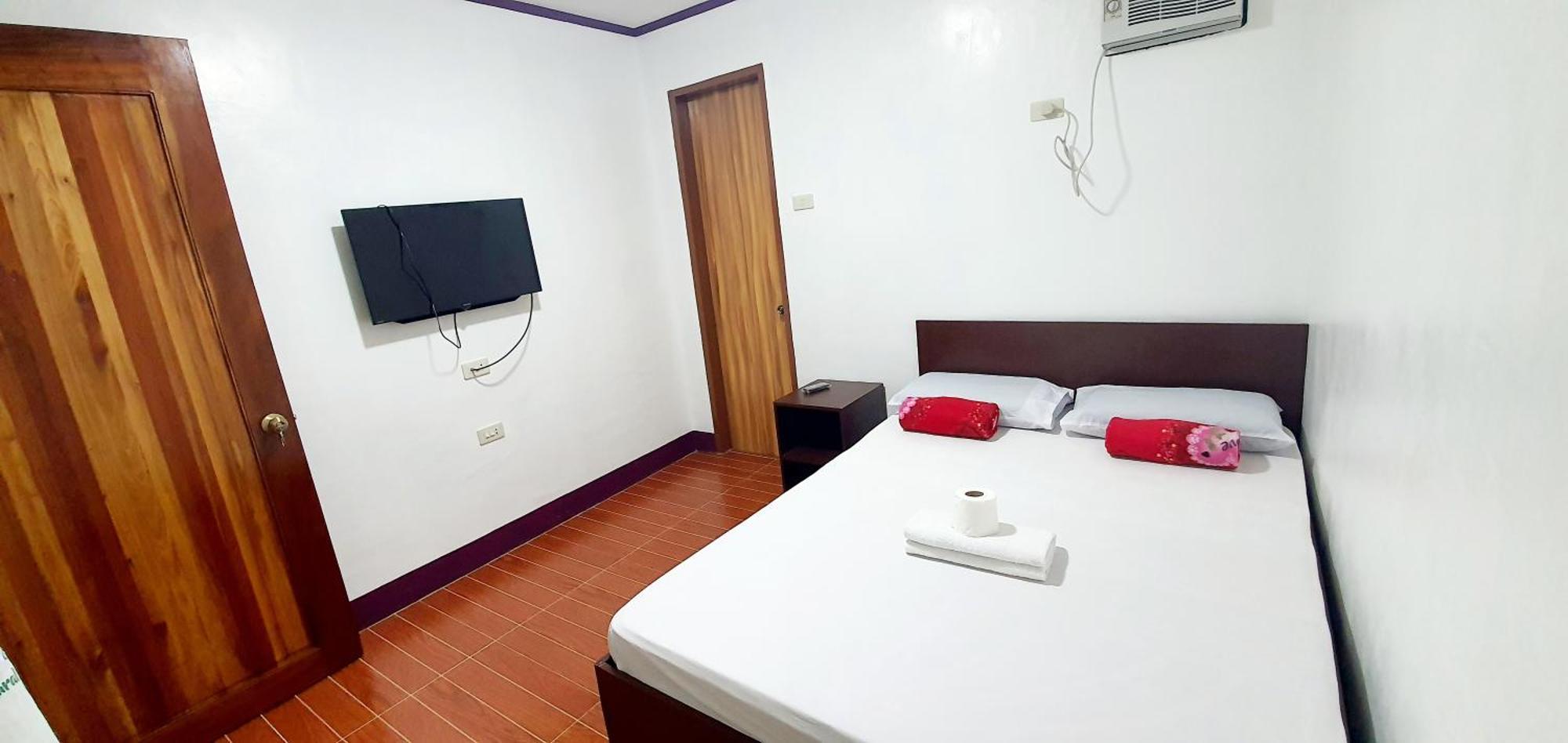 Sj Pabua Travellers Inn Mambajao Dış mekan fotoğraf